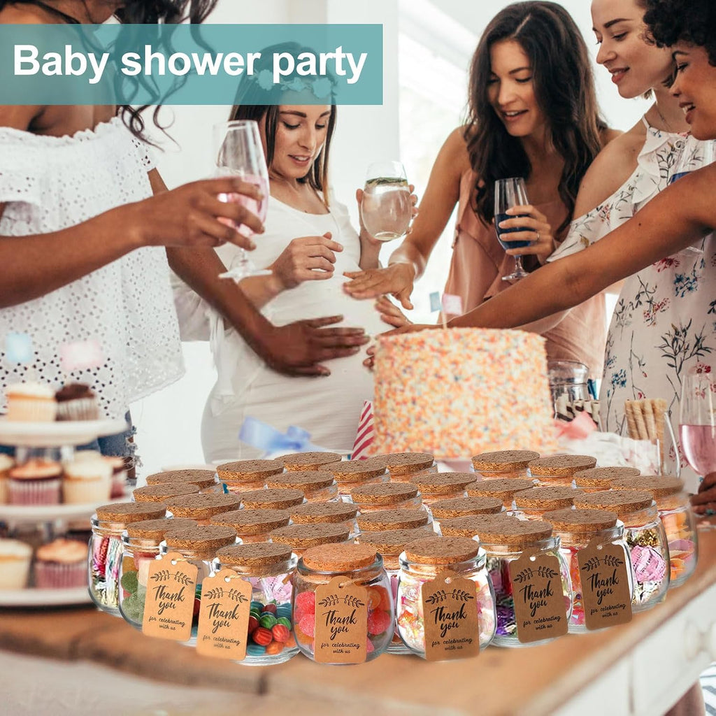 Classic glass jars styled for a baby shower favor table
